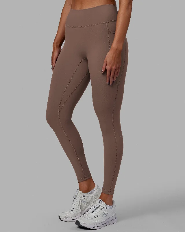 Fusion Full Length Leggings with Pockets - Deep Taupe Trendy Cut-Out Activewear Leggings Fusion Full Length Leggings with Pockets - Deep Taupe Trendy Cut-Out Activewear Leggings